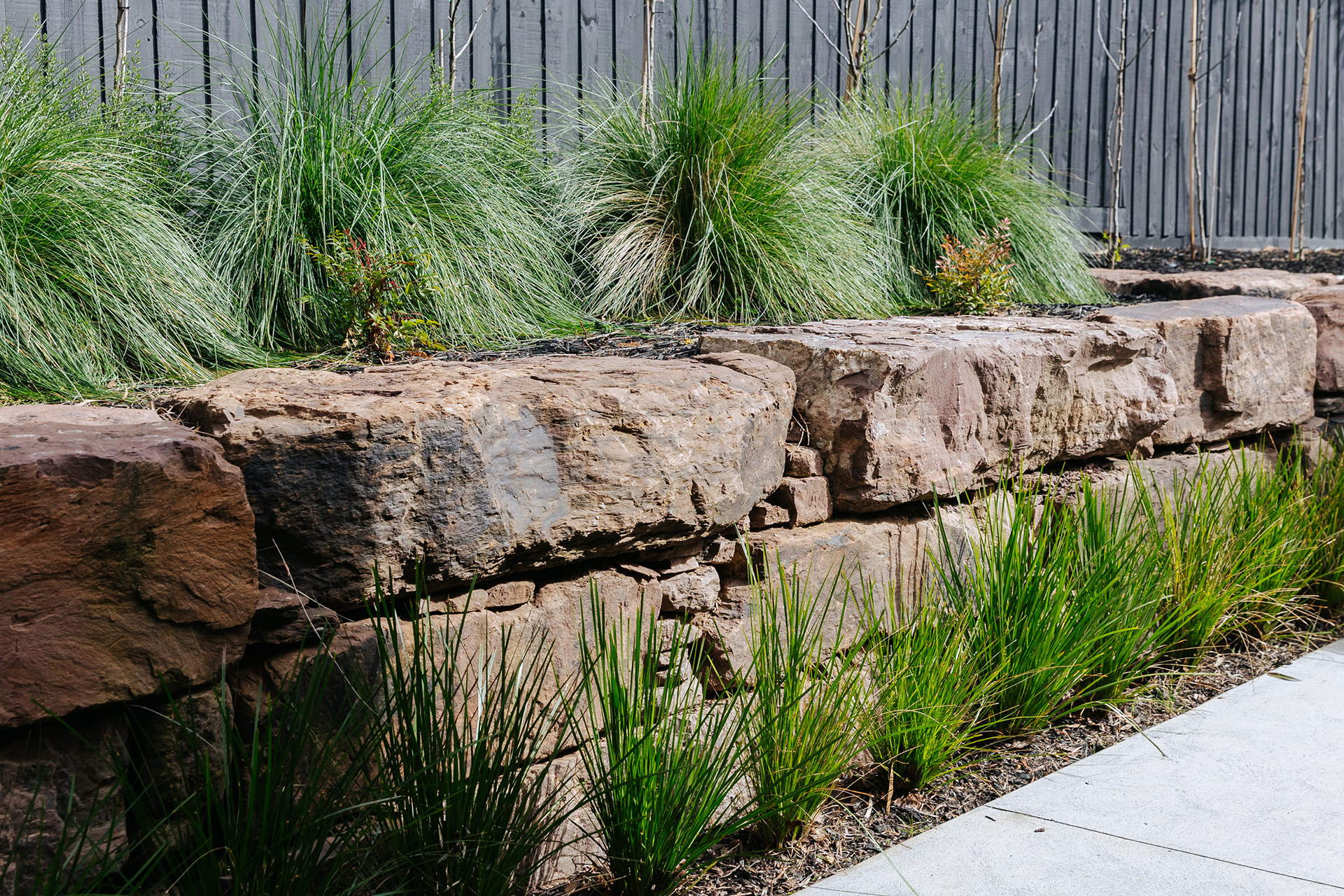 Pink Mudstone retaining rock wall by Transrock